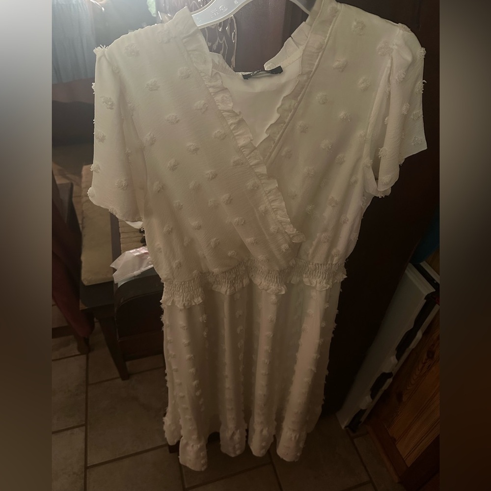 White dress - size L. Worn once. Excellent condition.